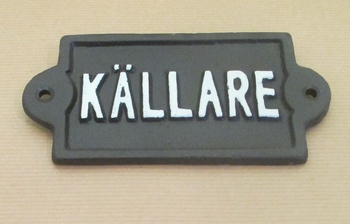 Gjutjärnsskylt: Källare