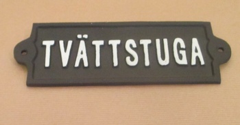 Gjutjärnsskylt: Tvättstuga