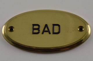 Oval skylt i mässing "Bad"